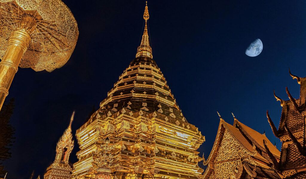 Golden chedi of Wat Phra That Doi Suthep at night in Chiang Mai