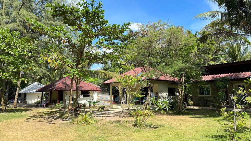 Garden bungalows at Lin’s Bungalow on Koh Chang surrounded by tropical trees