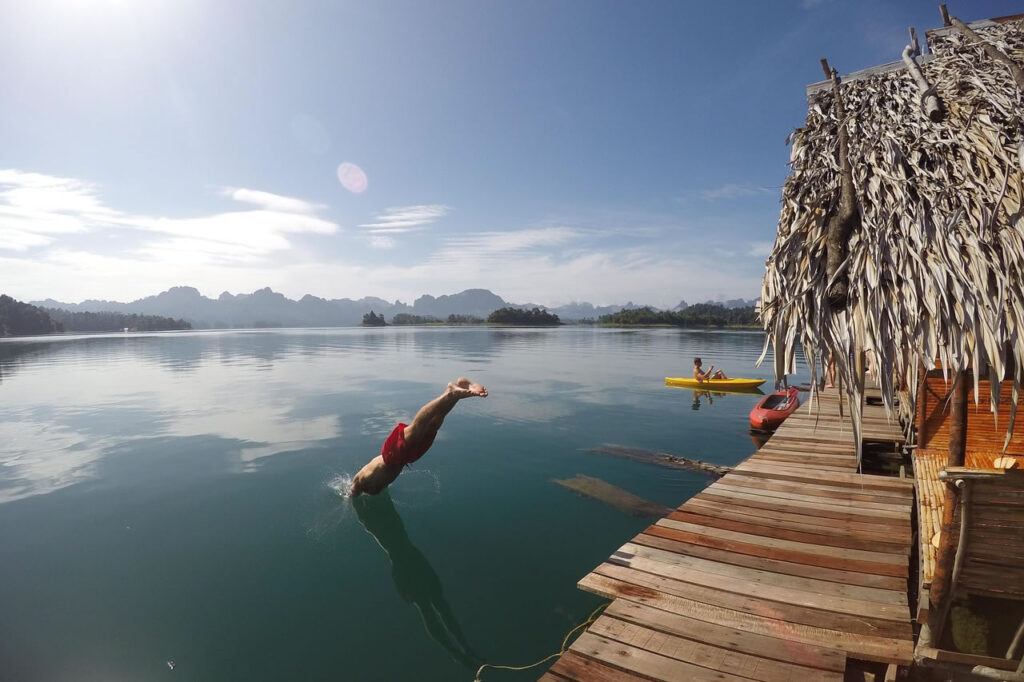 Swimming off a floating bungalow on Cheow Lan Lake in Khao Sok National Park