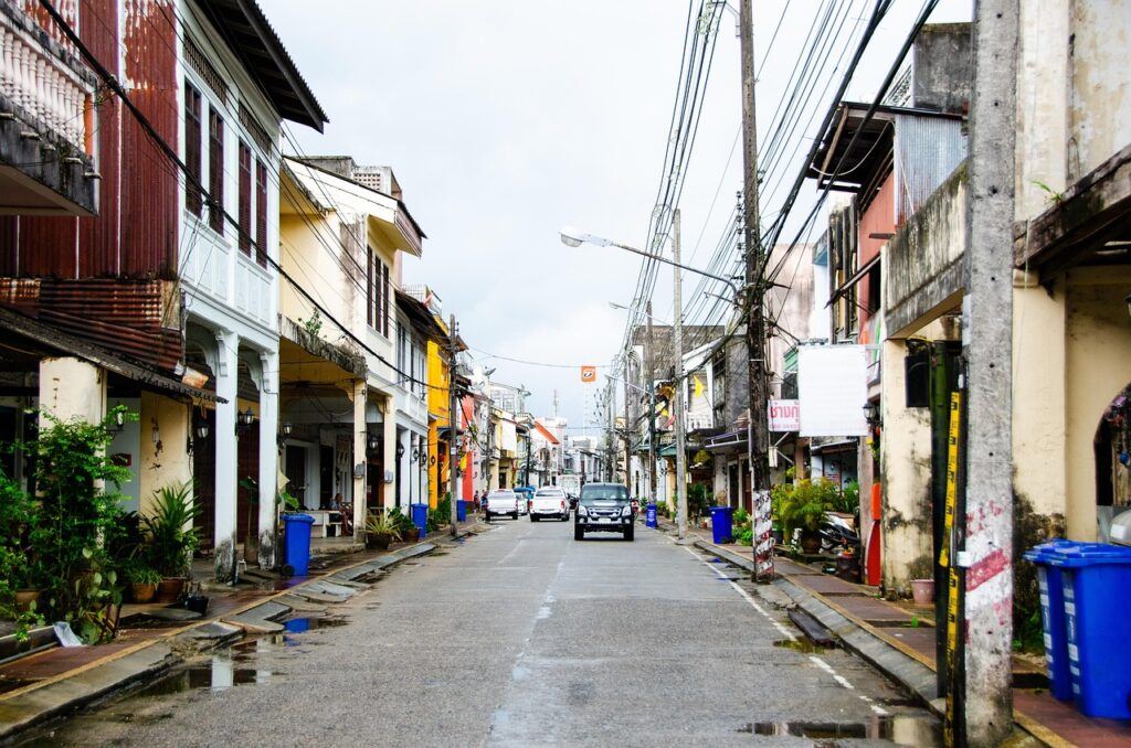 Local street in Phuket Old Town with traditional shophouses
