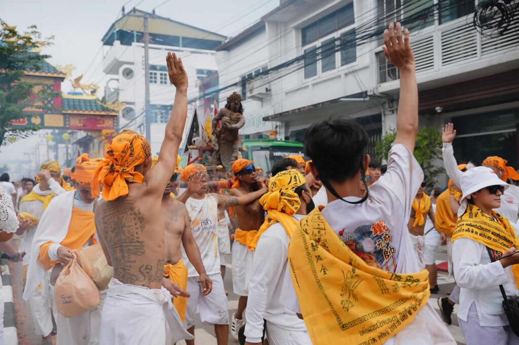 Devotees taking part in a procession during the Phuket Vegetarian Festival in Phuket Town