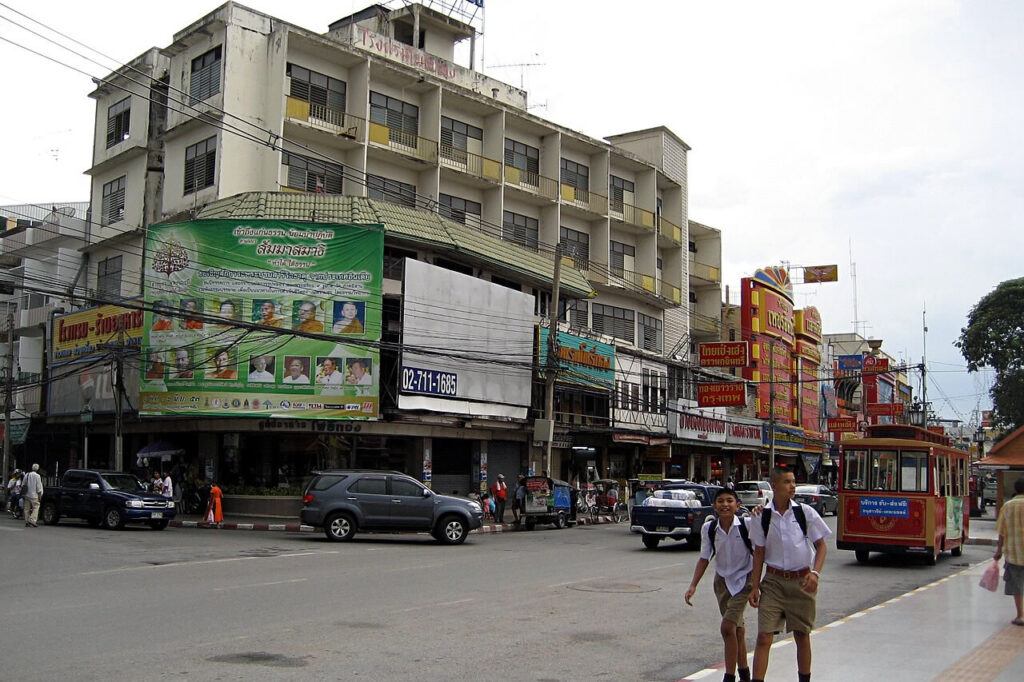 Street scene in Korat city center with local shops and traffic, Nakhon Ratchasima, Thailand