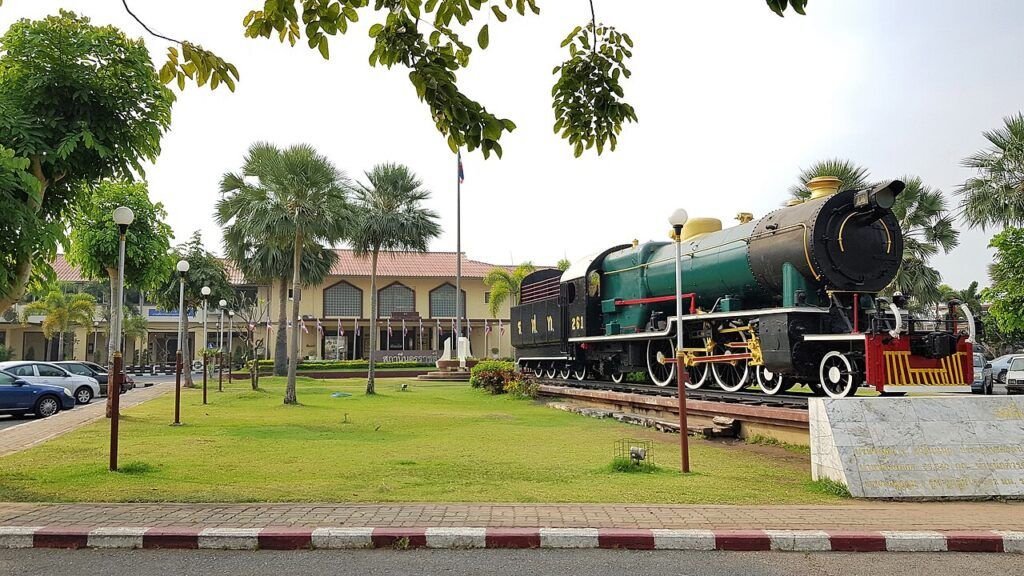 Historic steam locomotive displayed outside Nakhon Ratchasima train station in Korat, Thailand