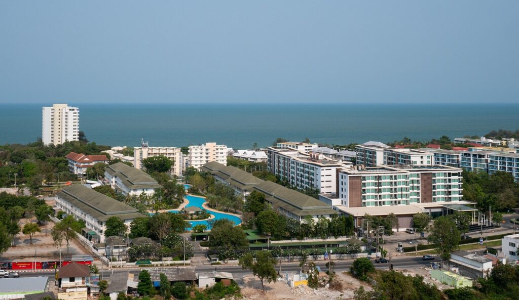 Resorts and hotels along the Hua Hin coastline with swimming pools and beachfront access