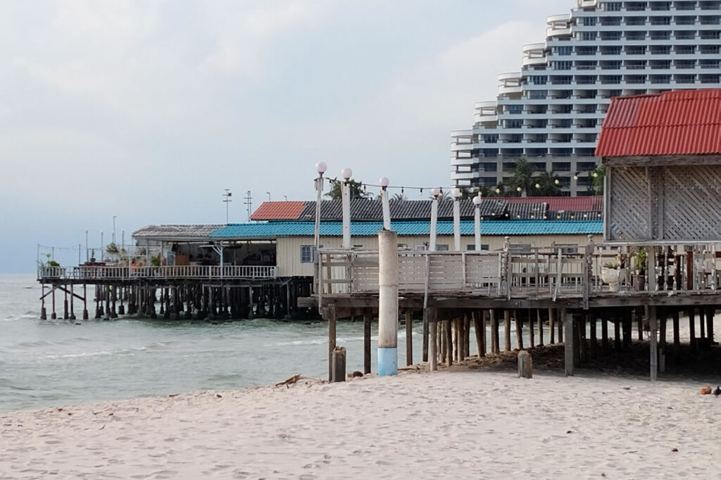 Beachfront restaurants and condominium buildings in Hua Hin, Thailand