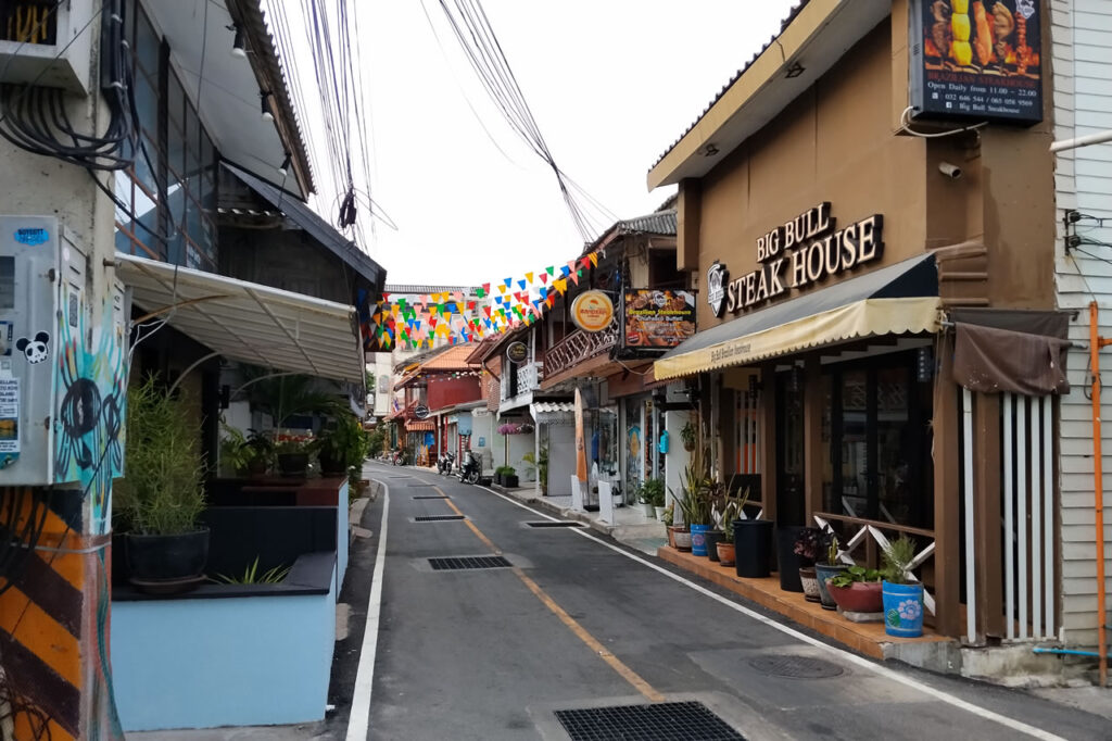 Restaurants and cafes along a small street in central Hua Hin, Thailand