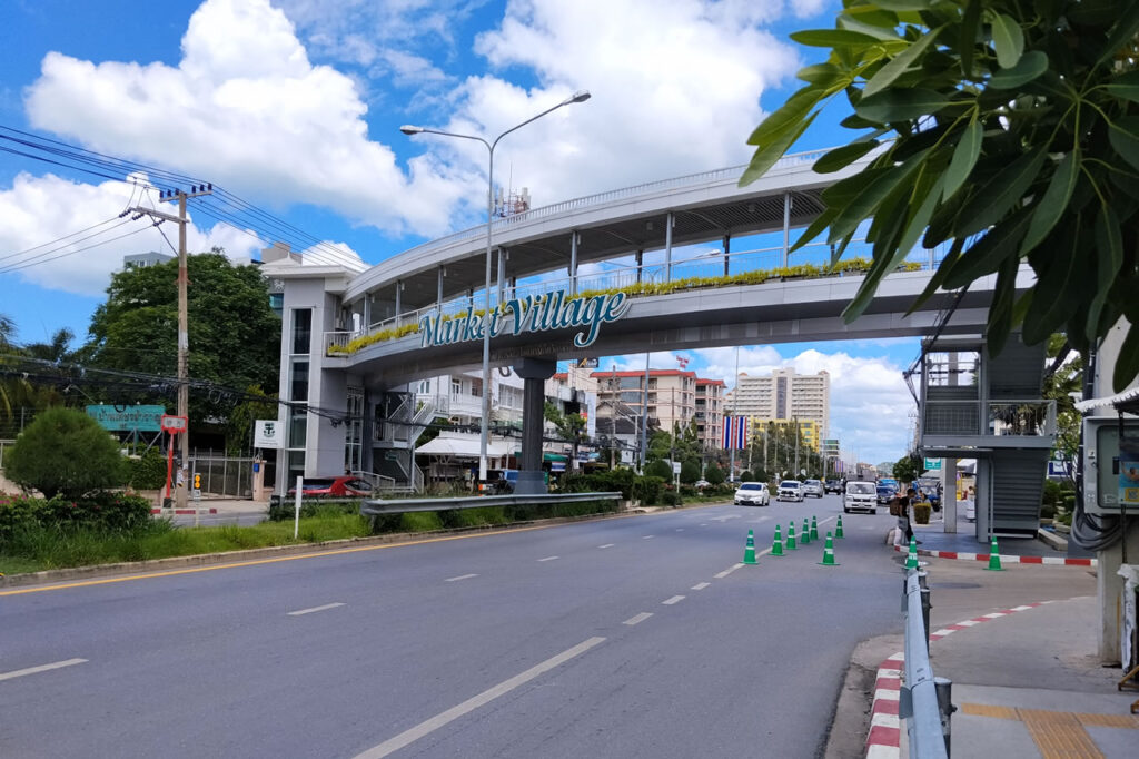 Market Village shopping center in Hua Hin, offering convenient access to shops, pharmacies, restaurants, banks, and everyday services for residents and retirees.