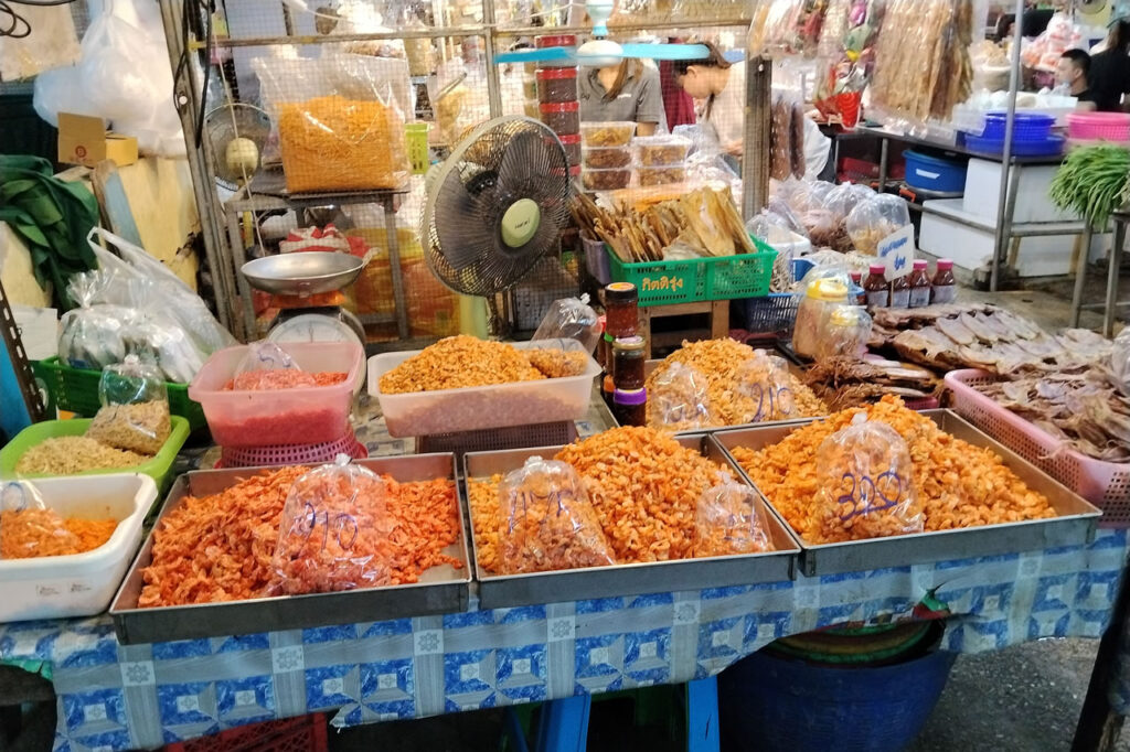 Local market in Hua Hin selling dried seafood and fresh produce as part of everyday life