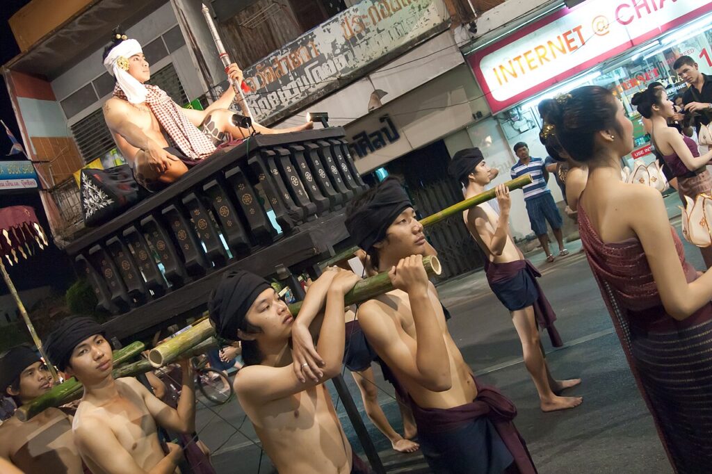 Traditional Loy Krathong procession through the streets of Chiang Mai