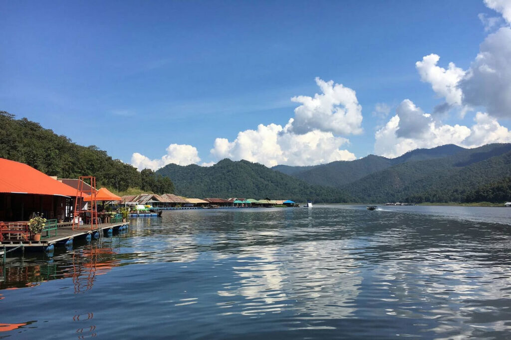 Floating resorts on Mae Ngat Reservoir surrounded by mountains near Chiang Mai