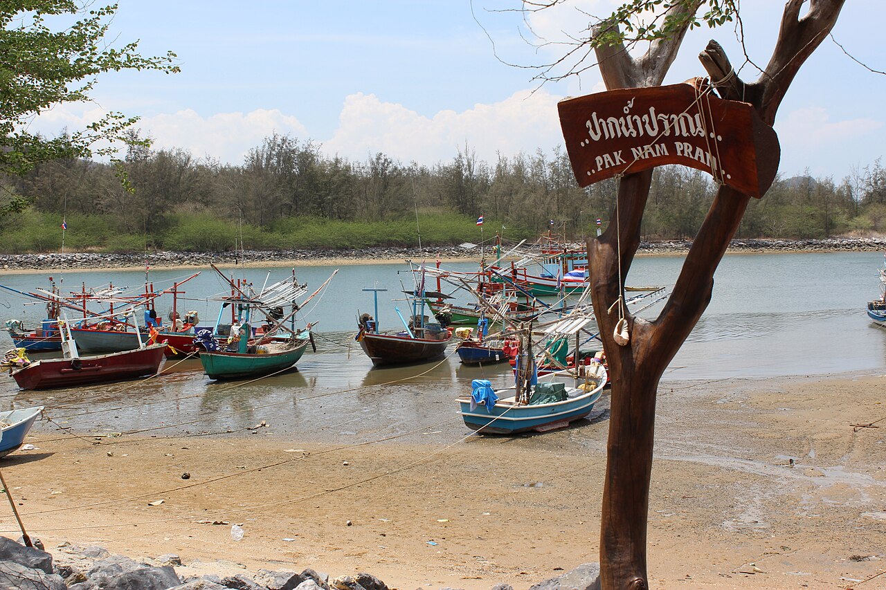 Colourful fishing boats in the harbour at Pak Nam Pran
