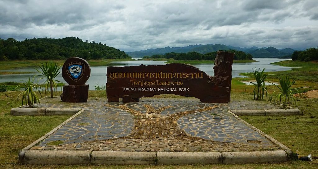 Kaeng Krachan National Park sign overlooking the reservoir and forested mountains